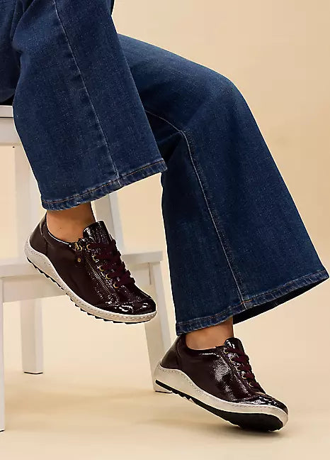 Burgundy trainer patent